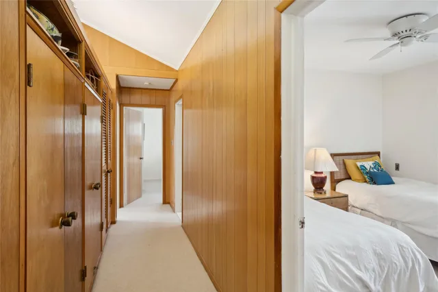 a bedroom with bed and window