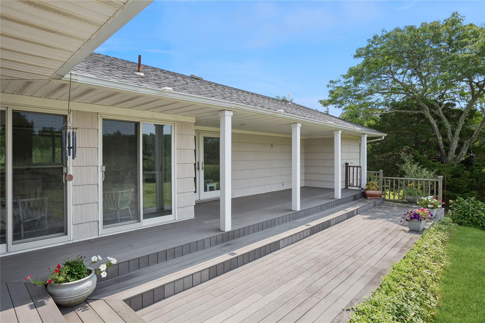 33 Beach Road Laurel, NY 11948 - Photo 27 of 38 a view of a house with a patio
