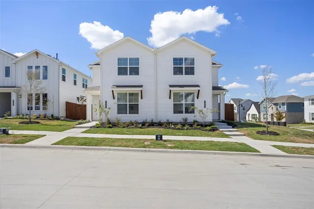 a front view of a building with a swimming pool
