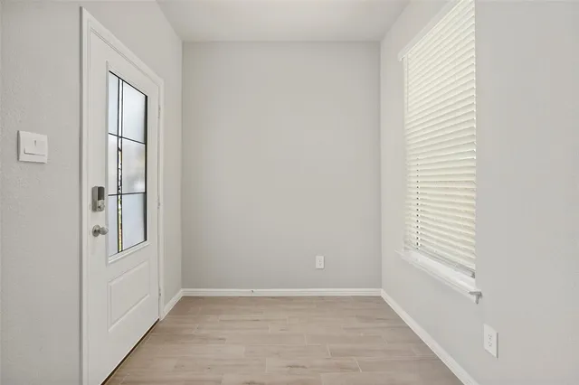 an empty room with windows