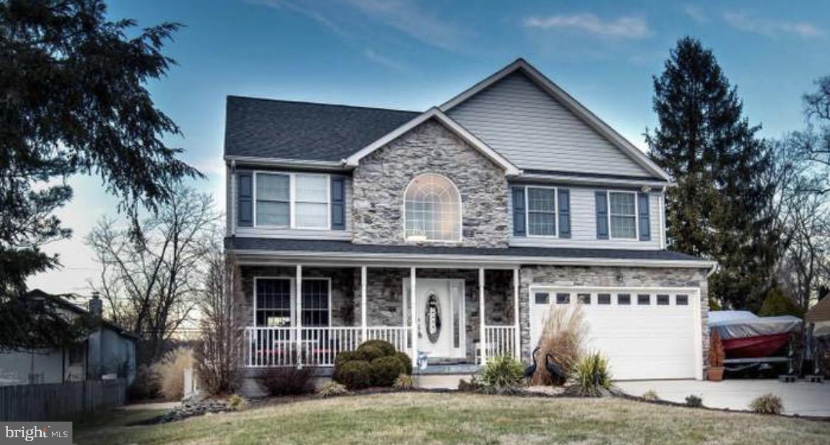 2220 Silver Lane Road Essex, MD 21221 - Photo 1 of 1 a view of a house with a yard and potted plants