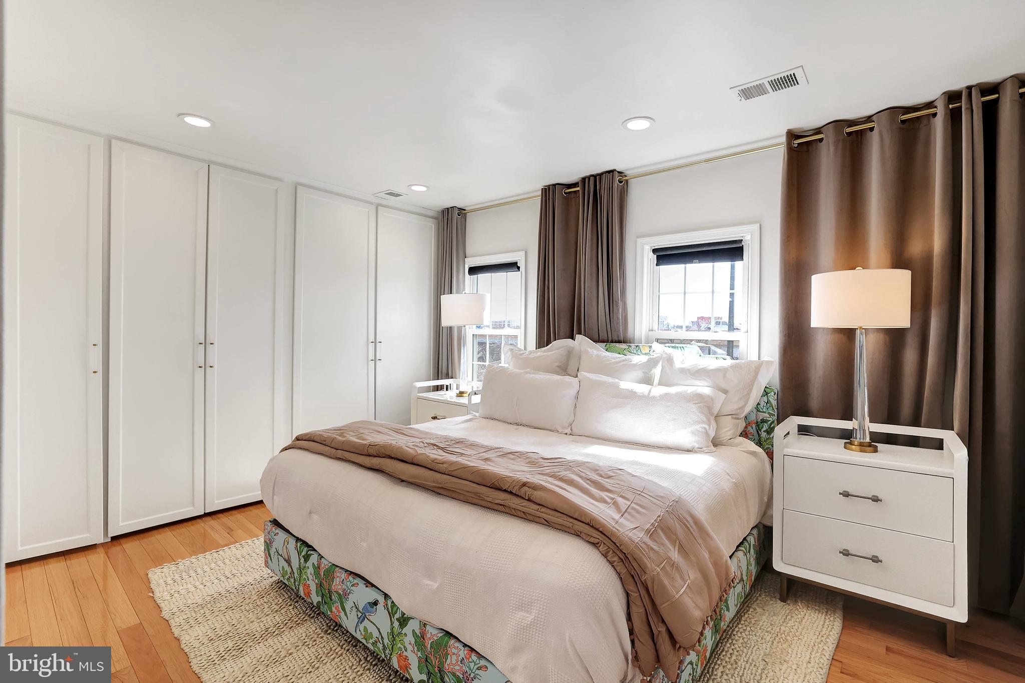 708 I Street Southeast Washington, DC 20003 - Photo 21 of 44 Primary Bedroom w/ King Bed & Custom Drapery Wall