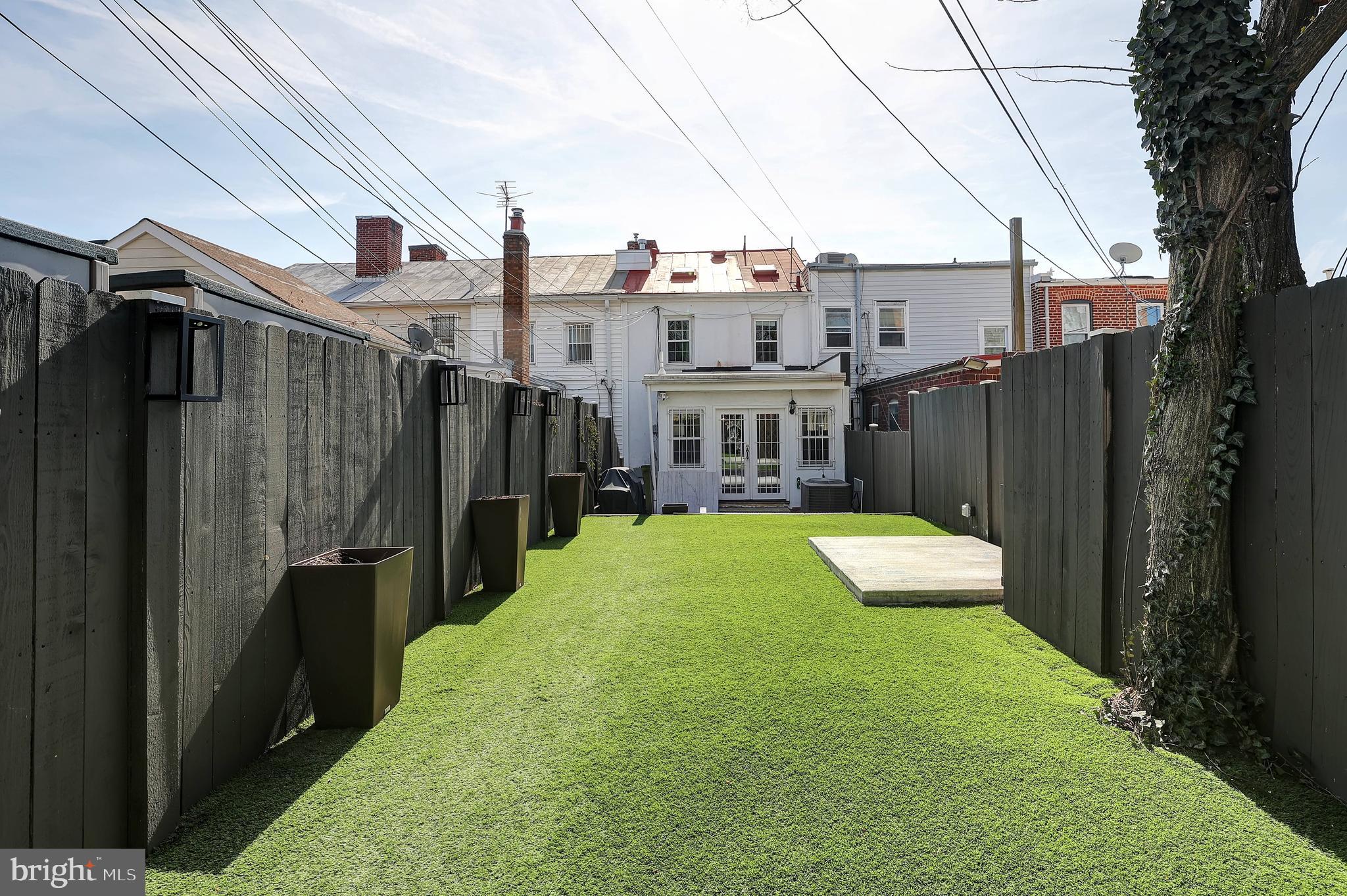 708 I Street Southeast Washington, DC 20003 - Photo 42 of 44 Low Maintenance AstroTurf Back Yard w/ Hot Tub Pad