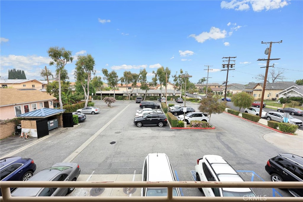 745 East Garvey Avenue, Unit 201 Monterey Park, CA 91755 - Photo 5 of 6 a view of a balcony and car parked