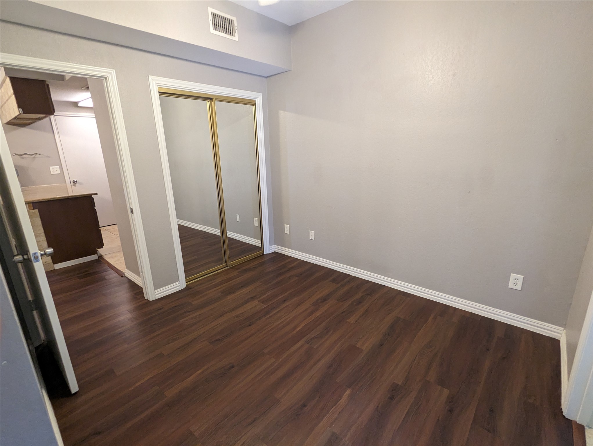 601 Nelray Boulevard, Unit 3 Austin, TX 78751 - Photo 9 of 12 wooden floor in an empty room