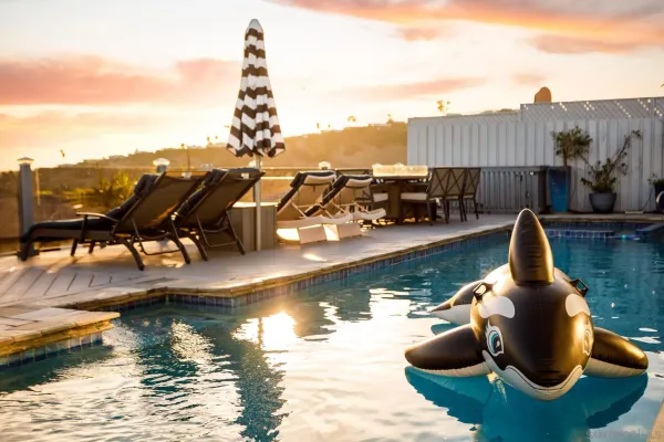 a top view of a lake with couches chairs