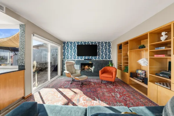 a living room with a couch and a flat screen tv