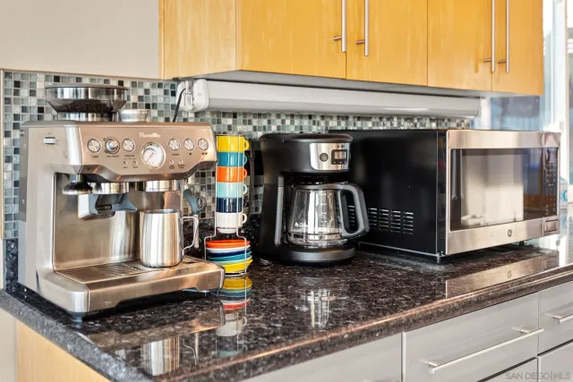 a living room with a couch and a flat screen tv