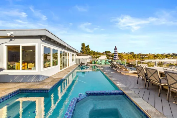 a view of a balcony with chairs