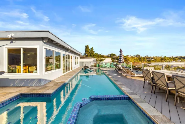 a view of a balcony with chairs