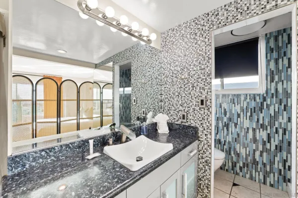 a bed room with a bed and a television