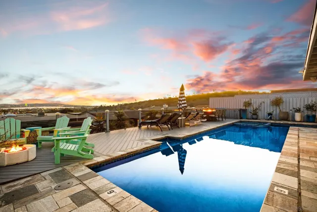 a view of a terrace with wooden floor and city view