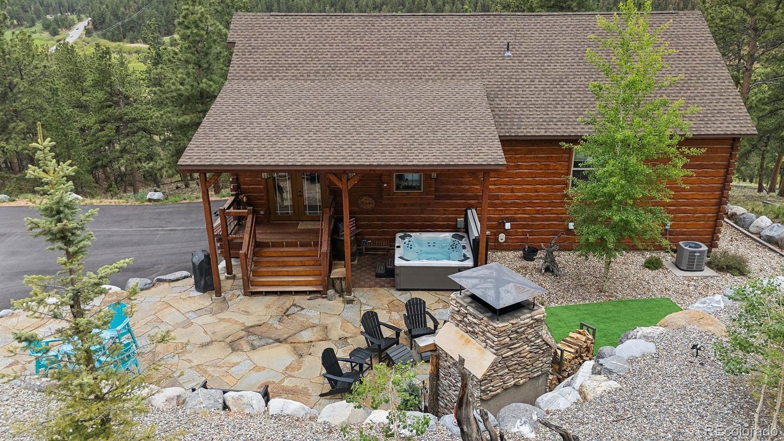 2894 County Road 43 Bailey, CO 80421 - Photo 3 of 40 an aerial view of a house with patio