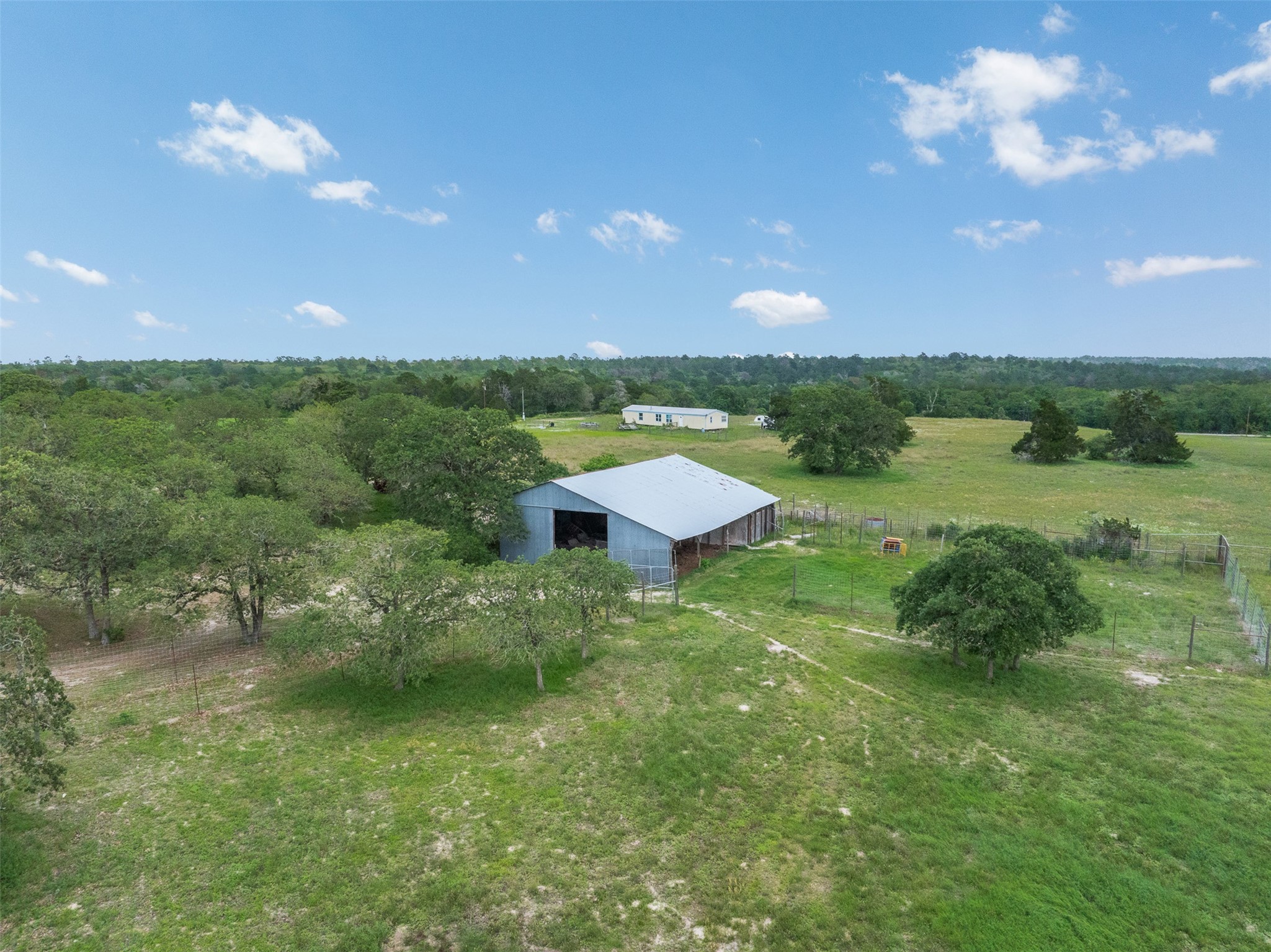 622 Red Rock Ranch Road Red Rock, TX 78662 - Photo 45 of 46 a view of a lake with a yard