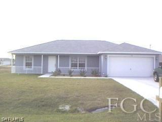 a house view with a garden space