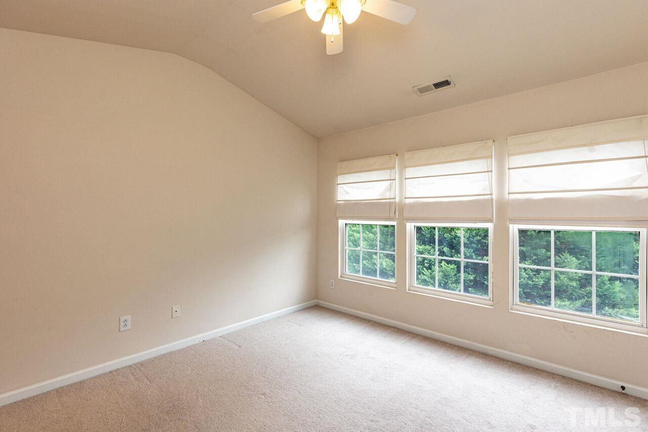 1730 Sorrell Brook Way Raleigh, NC 27609 - Photo 23 of 30 an empty room with a window
