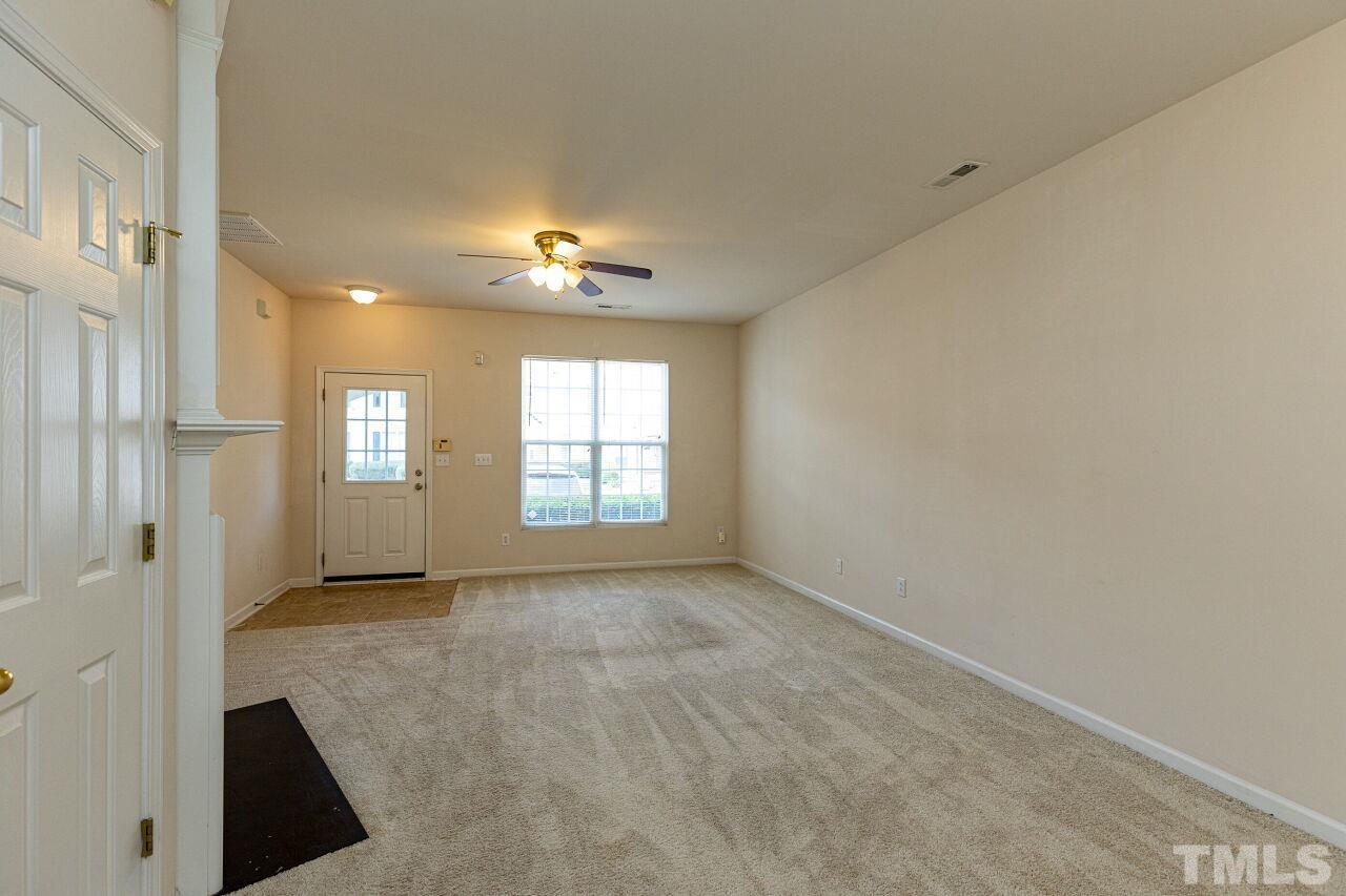 1730 Sorrell Brook Way Raleigh, NC 27609 - Photo 9 of 30 an empty room with windows and closet
