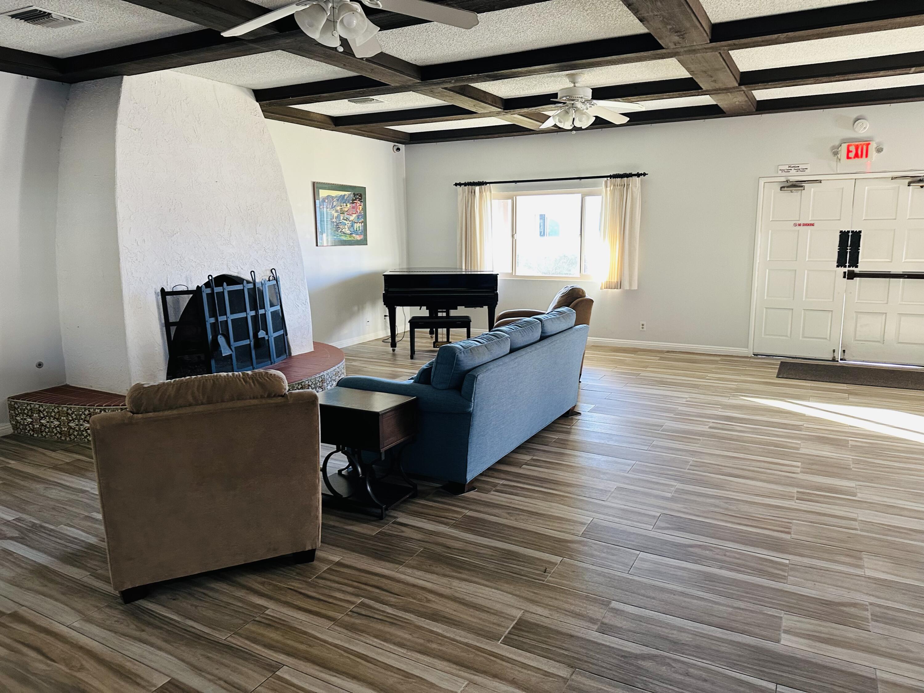 6180 Via Real, Unit 29 Carpinteria, CA 93013 - Photo 11 of 24 a living room with furniture and a wooden floor