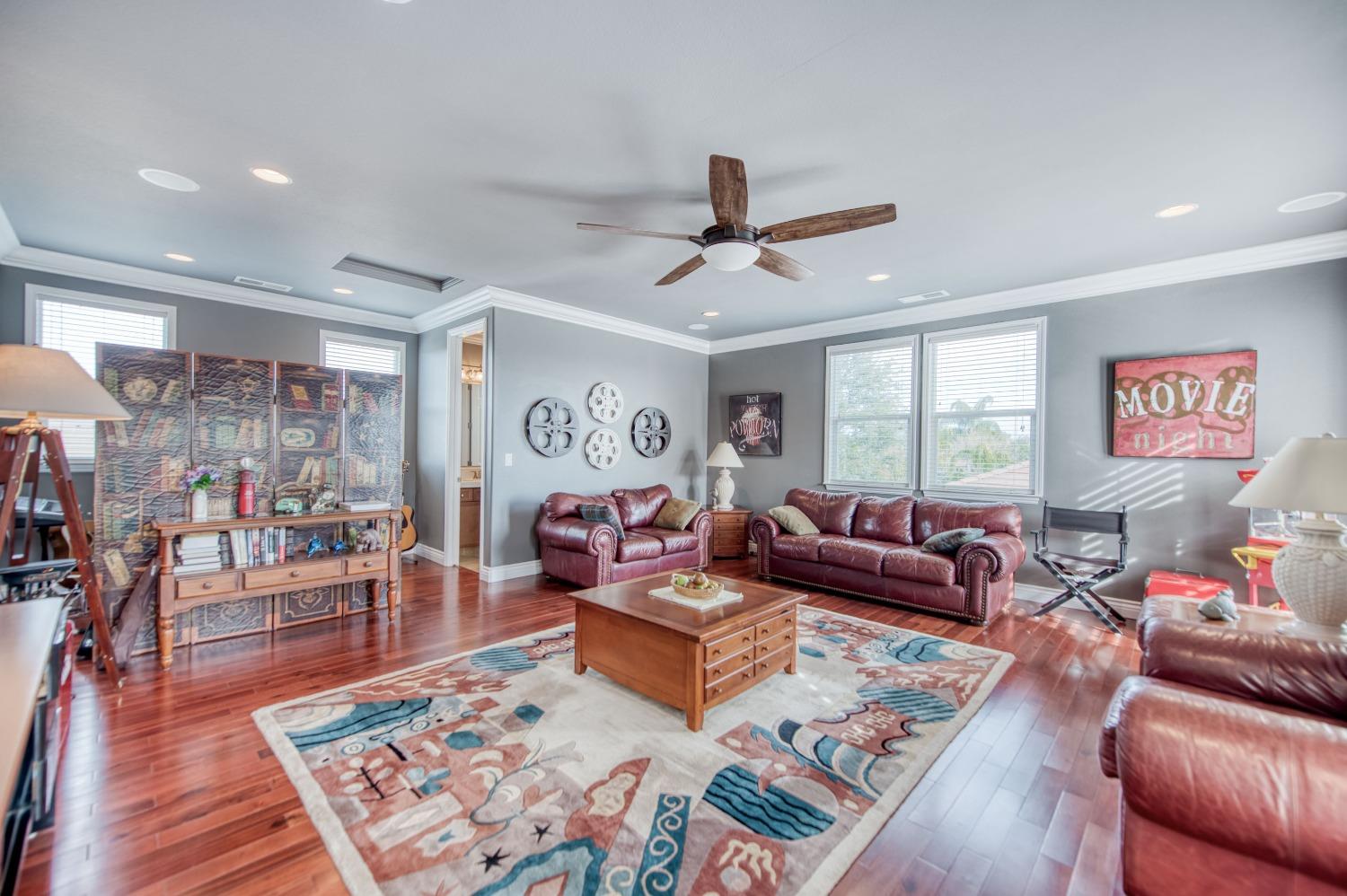 3207 Dennis Avenue Clovis, CA 93619 - Photo 30 of 55 a living room with furniture and a rug