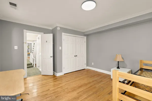 a view of a livingroom with wooden floor