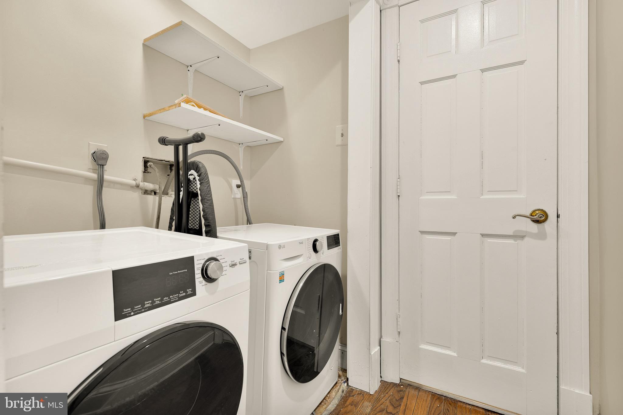 228 East Capitol Street Northeast Washington, DC 20003 - Photo 24 of 27 a utility room with dryer and washer
