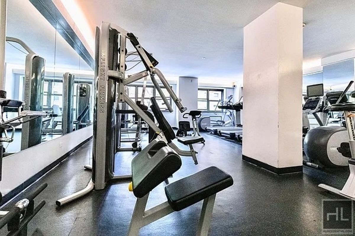 200 East 72nd Street, Unit 34N Manhattan, NY 10021 - Photo 8 of 12 a view of a room with gym equipment