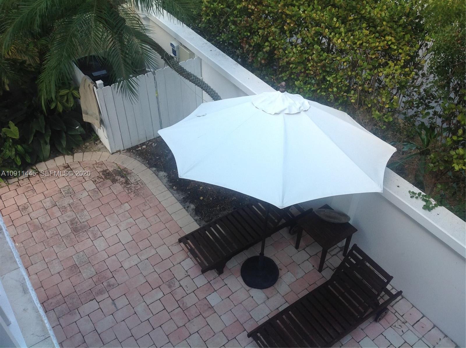 4 Turtle Walk, Unit 4 Key Biscayne, FL 33149 - Photo 17 of 54 a view of roof deck with furniture