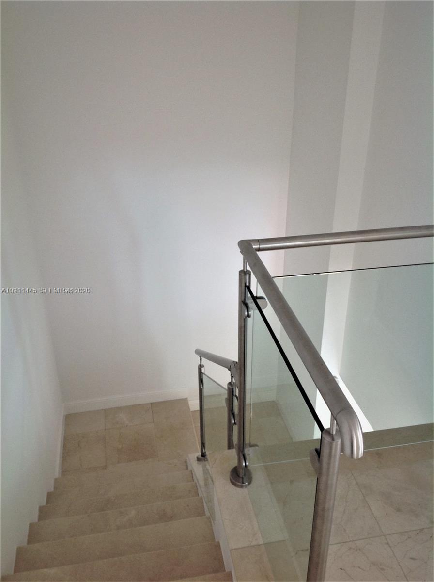 4 Turtle Walk, Unit 4 Key Biscayne, FL 33149 - Photo 23 of 54 a view of entryway