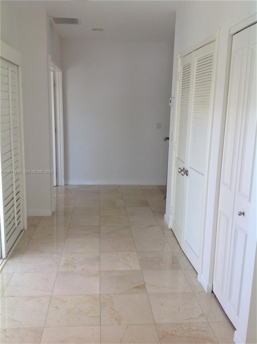 4 Turtle Walk, Unit 4 Key Biscayne, FL 33149 - Photo 32 of 54 Hall access to bedrooms.