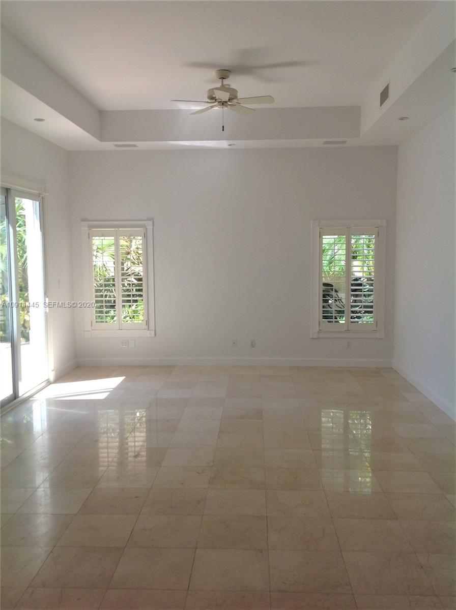 4 Turtle Walk, Unit 4 Key Biscayne, FL 33149 - Photo 6 of 54 an empty room that has a window in it