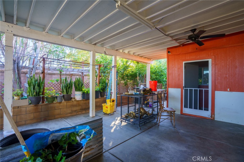 1553 West Ceres Street Rialto, CA 92376 - Photo 49 of 73 a view of a porch with furniture and garden