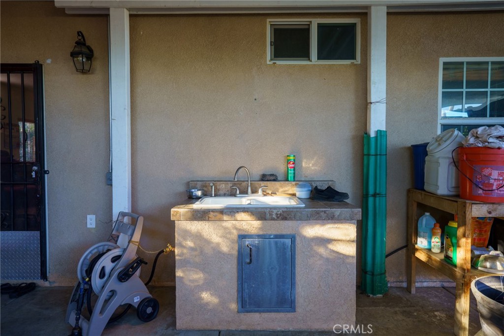1553 West Ceres Street Rialto, CA 92376 - Photo 51 of 73 a utility room with dryer and washer