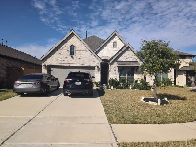 a car parked in front of a house