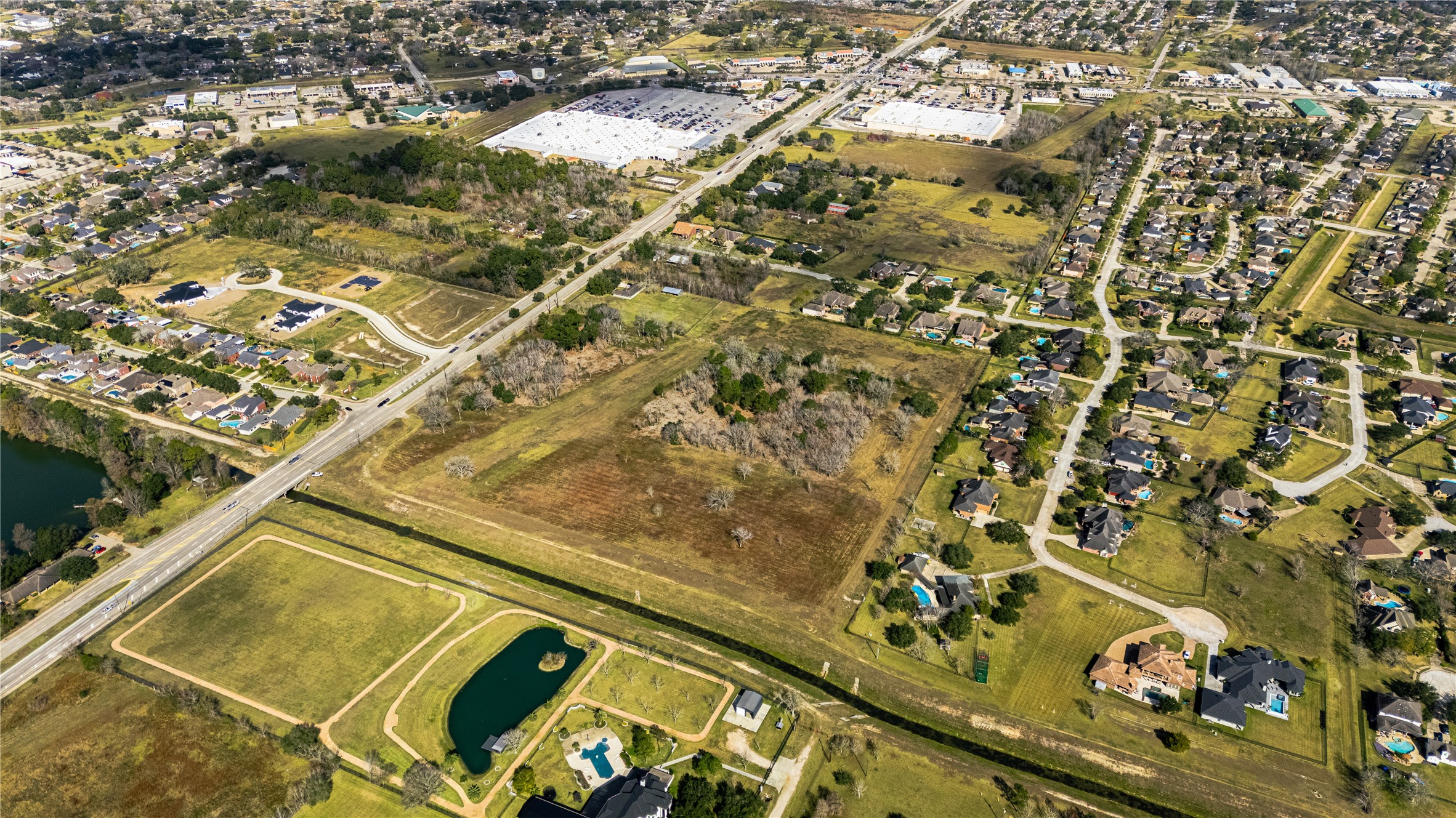 0 Dixie Farm Road Pearland, TX 77581 - Photo 6 of 11 an aerial view of a residential houses with yard