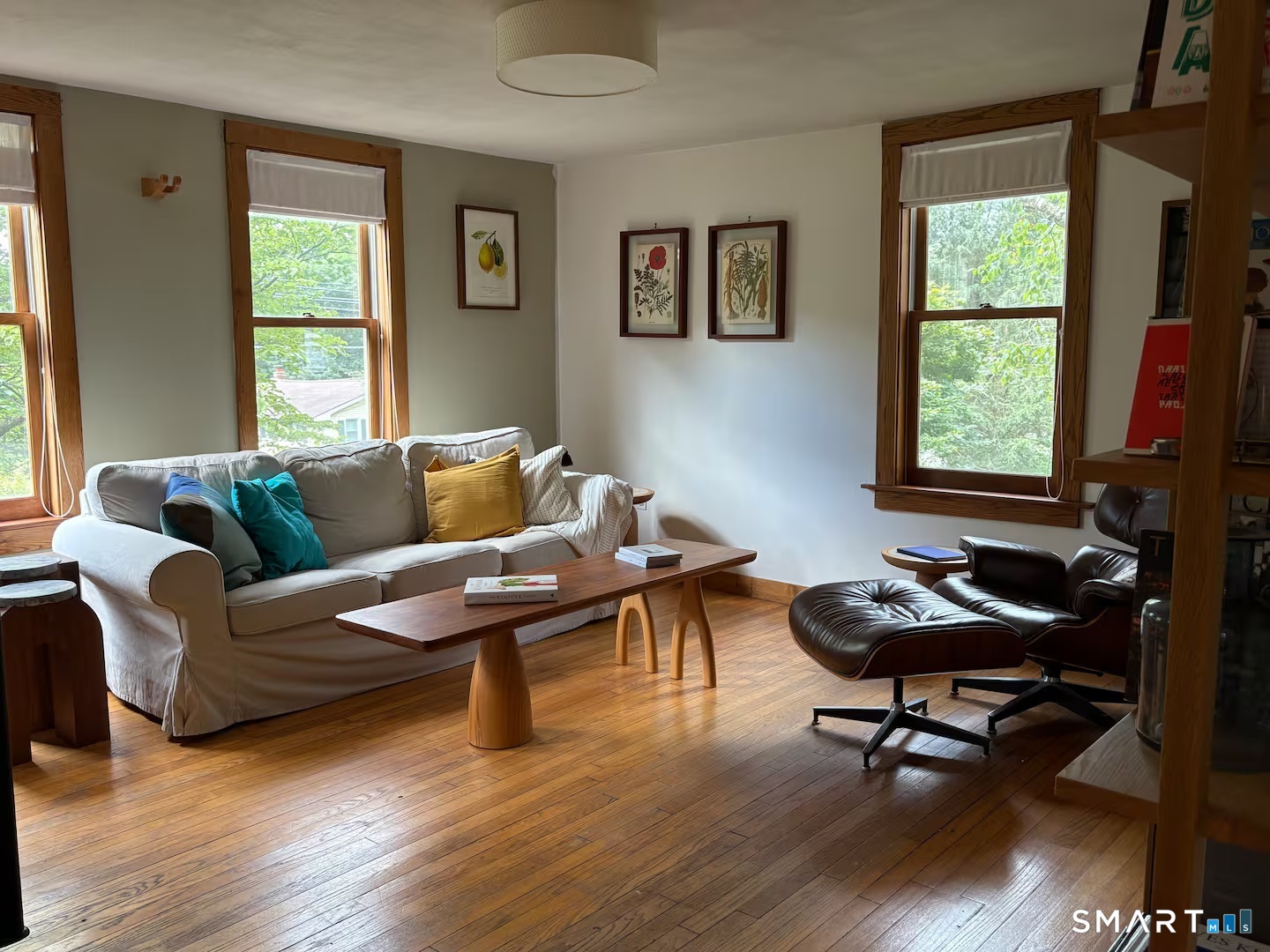 895 Tolland Stage Road Tolland, CT 06084 - Photo 8 of 33 a living room with furniture and a window