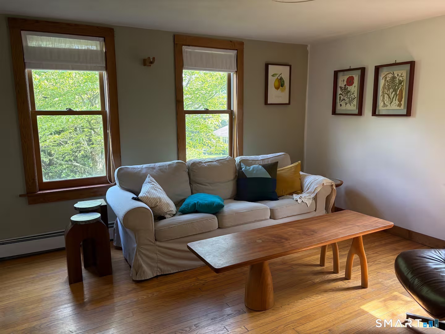 895 Tolland Stage Road Tolland, CT 06084 - Photo 10 of 33 a living room with furniture and a window