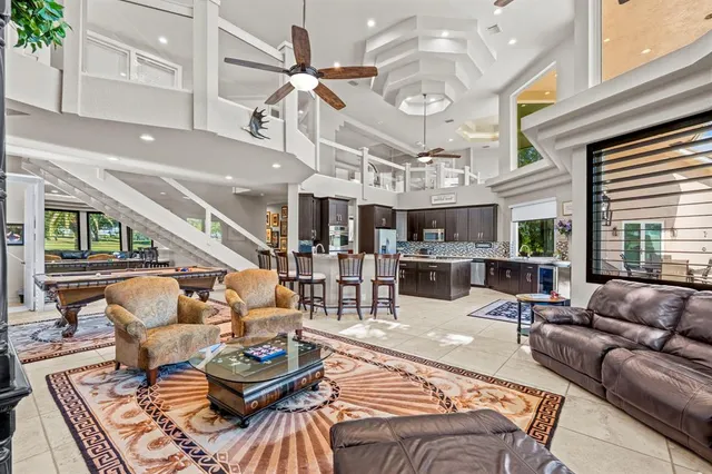 a balcony with table and chairs