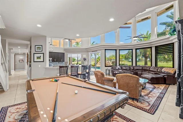 a bedroom with a bed dresser and a window