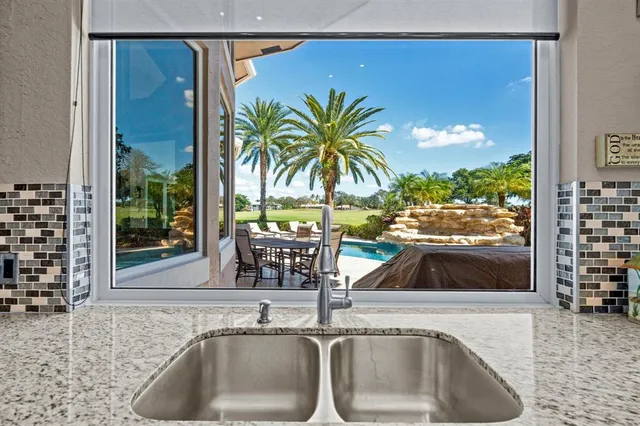a white toilet sitting next to a shower curtain