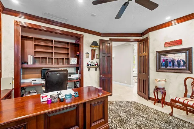a bathroom with a granite countertop sink mirror and a toilet