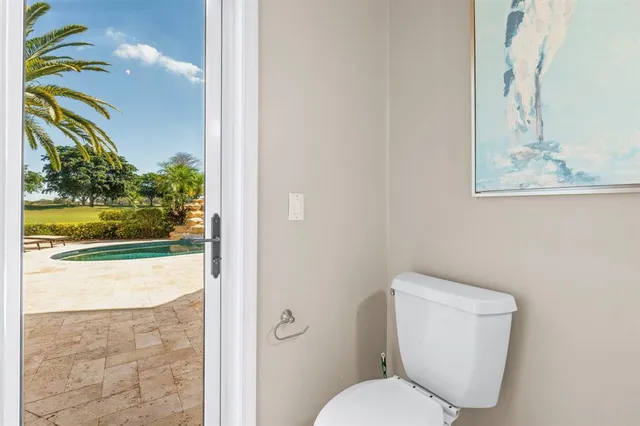 a bathroom with a toilet a sink and a bathtub