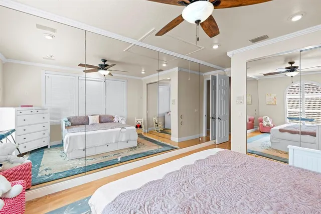 a view of a backyard with swimming pool and sitting area