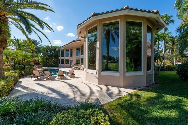 a room with gym equipment and a large window