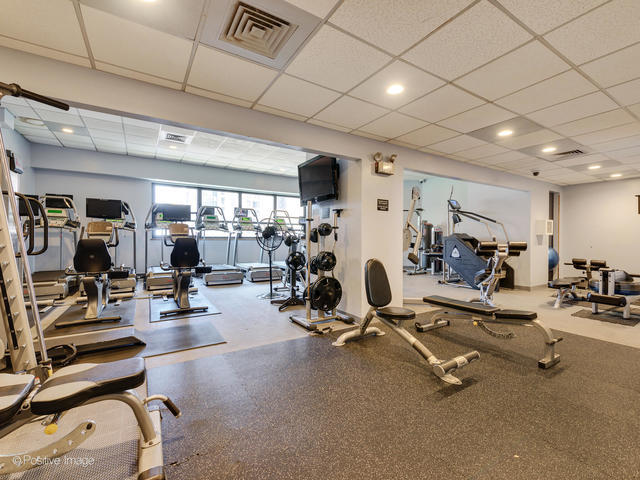 1030 North State Street, Unit 2GH Chicago, IL 60610 - Photo 32 of 36 a view of a room with gym equipment