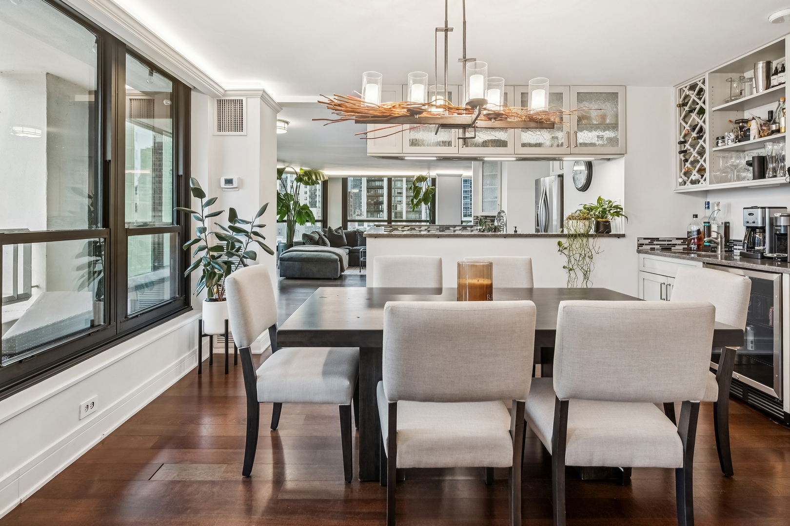 1030 North State Street, Unit 2GH Chicago, IL 60610 - Photo 5 of 36 a view of a dining room with furniture window and wooden floor