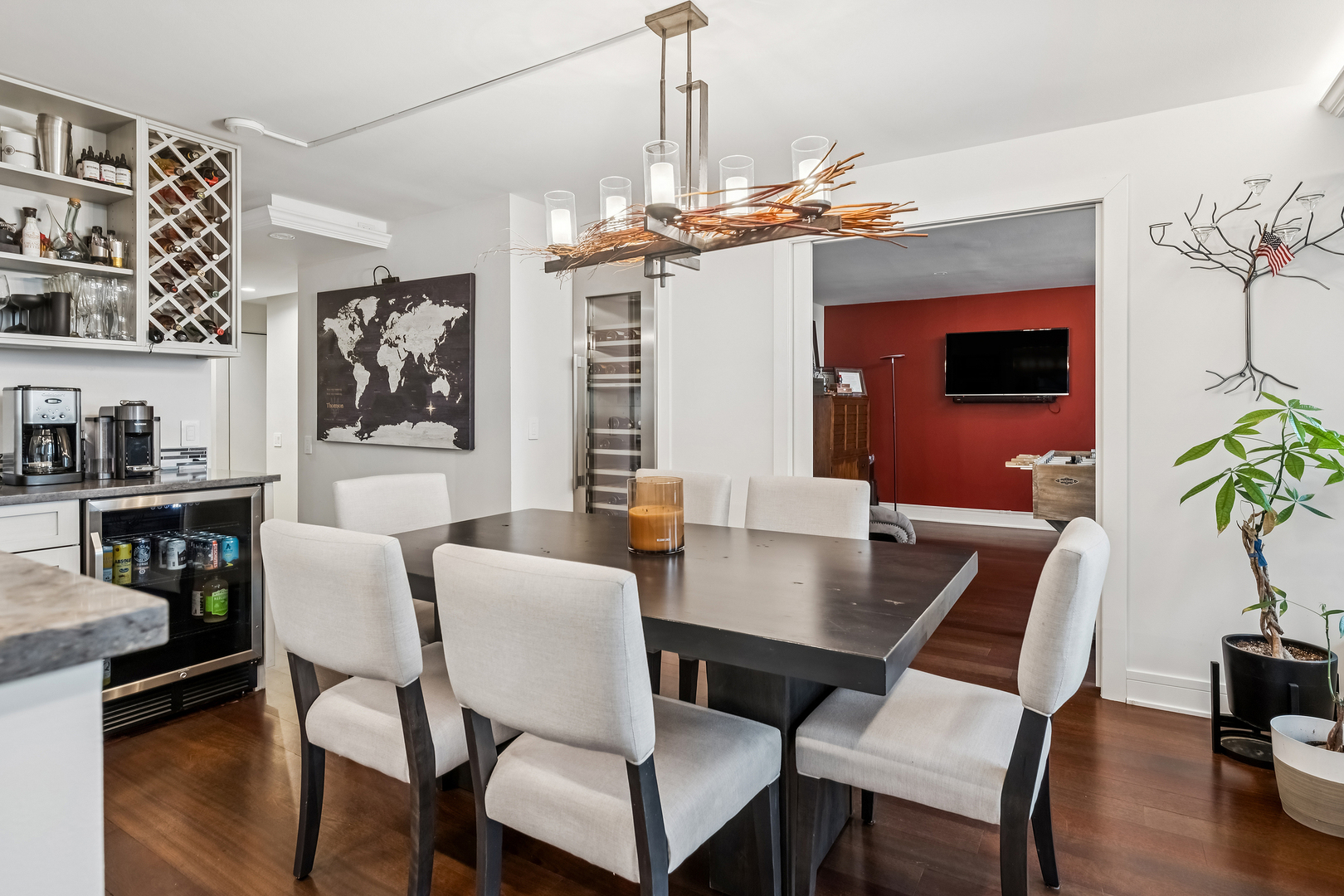 1030 North State Street, Unit 2GH Chicago, IL 60610 - Photo 6 of 36 a view of a dining room with furniture and wooden floor