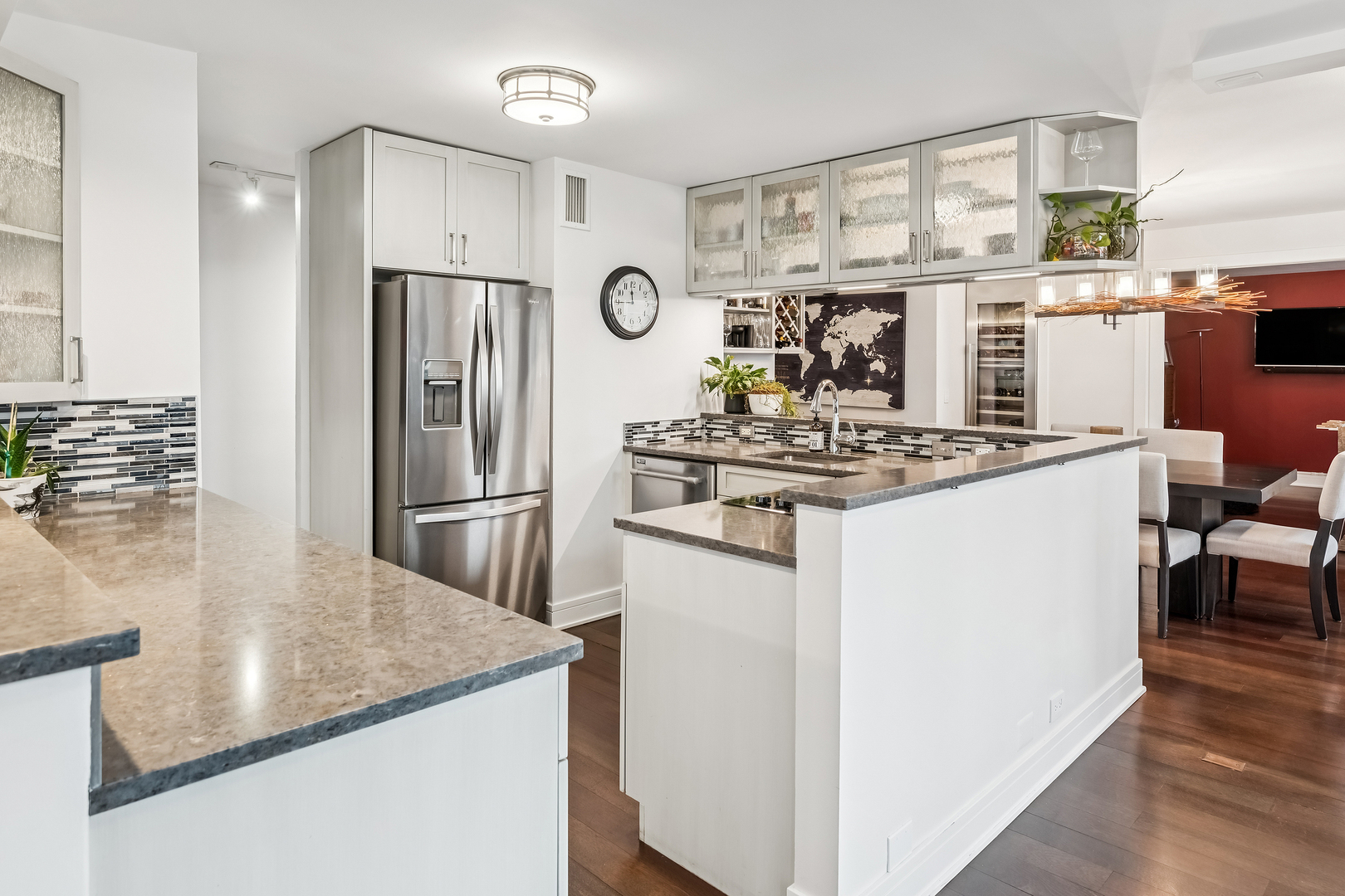 1030 North State Street, Unit 2GH Chicago, IL 60610 - Photo 8 of 36 a kitchen with stainless steel appliances granite countertop a sink stove and refrigerator