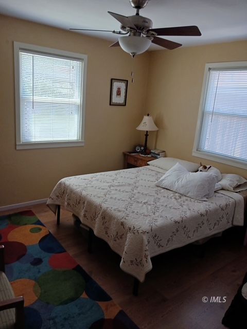 103 North Clay Street Independence, CA 93526 - Photo 14 of 25 a bedroom with a bed and a window