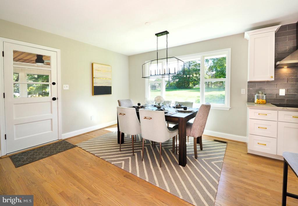 4607 Carroll Manor Road Baldwin, MD 21013 - Photo 12 of 53 Formal Dining Room w/ Hardwood Flooring
