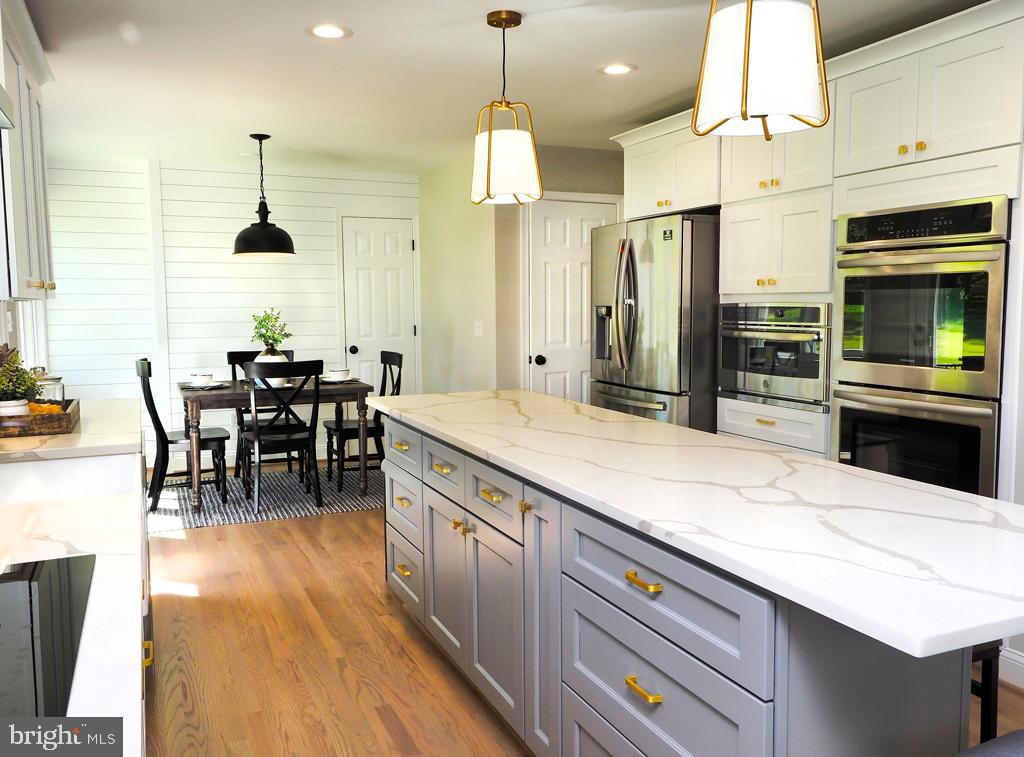 4607 Carroll Manor Road Baldwin, MD 21013 - Photo 3 of 53 Spacious Kitchen Island with Quartz Countertop